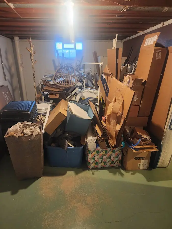 Roll-off dumpster container at job site for Yard Waste Dumpster Rental in Pinehurst